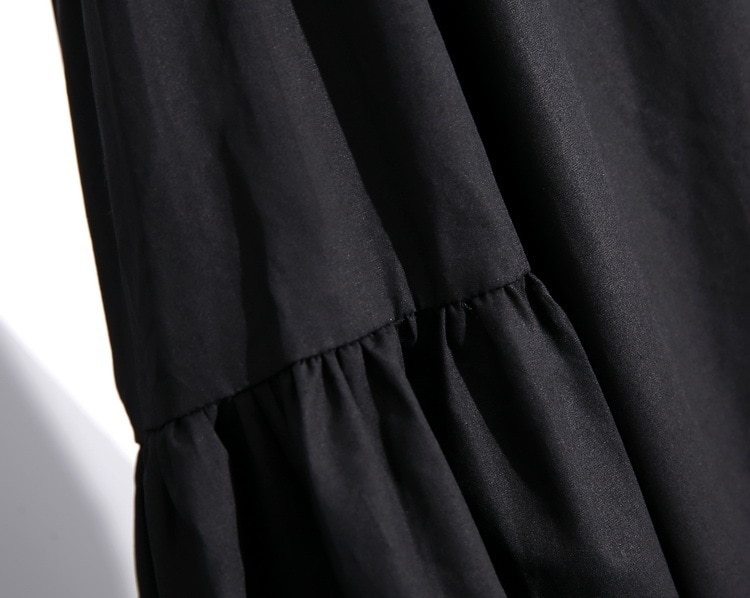 Women's Long Sleeved Black Dress with Metal Rings